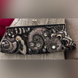 Intricate beaded clutch
